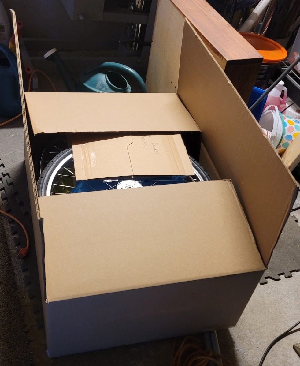 A sulky and its gear packed in one shipping box
